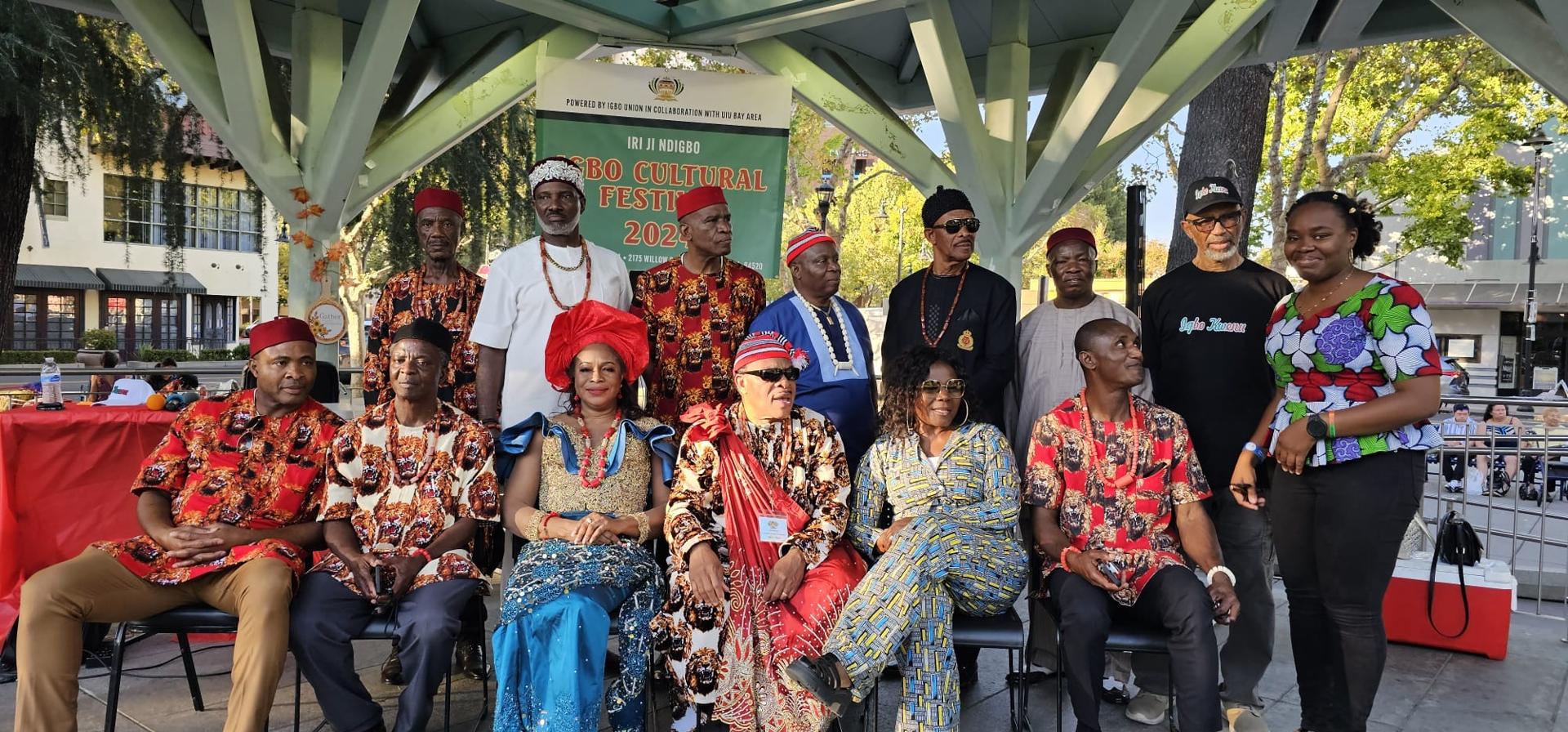 Igbo Union members gathered beneath a cultural festival banner